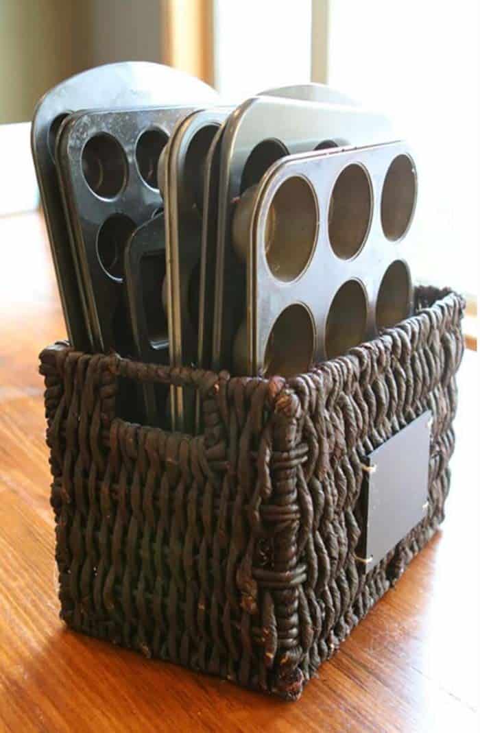 Store Your Muffin Tins with a Dollar Store Wicker Basket