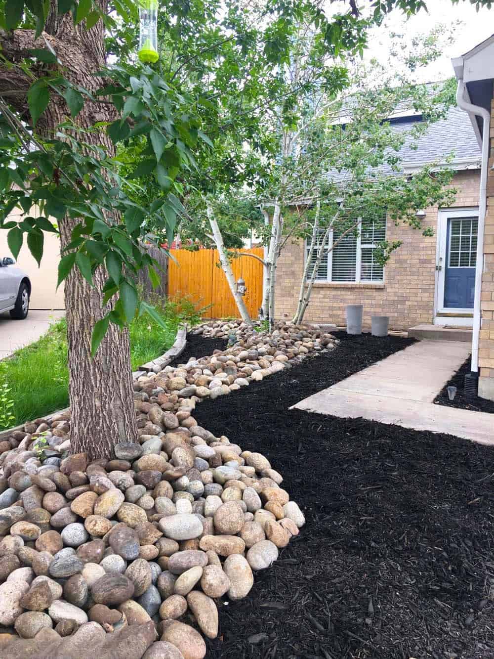 River Rock Tree Beds