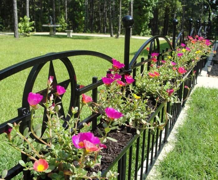 Iron Fence With Integrated Flower Baskets