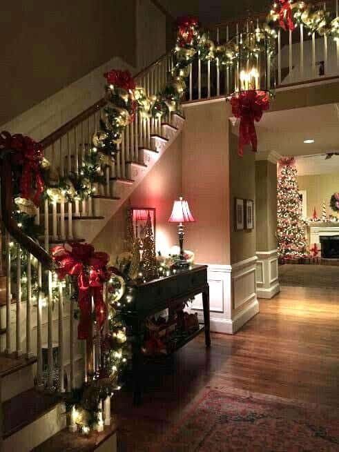 Add Color to Your Staircase Garland with Big Red Bows