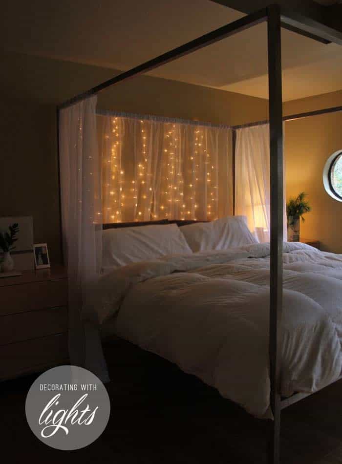 Hang String Lights Behind Curtain on Four Poster Bed