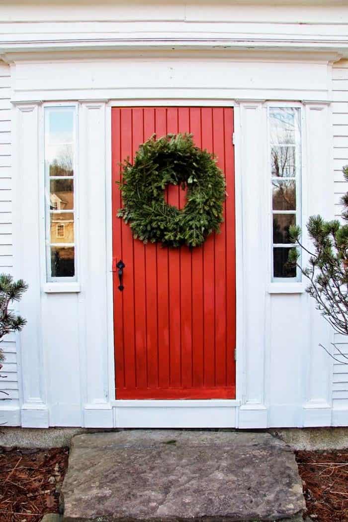 Festive Red Pops Against A White House