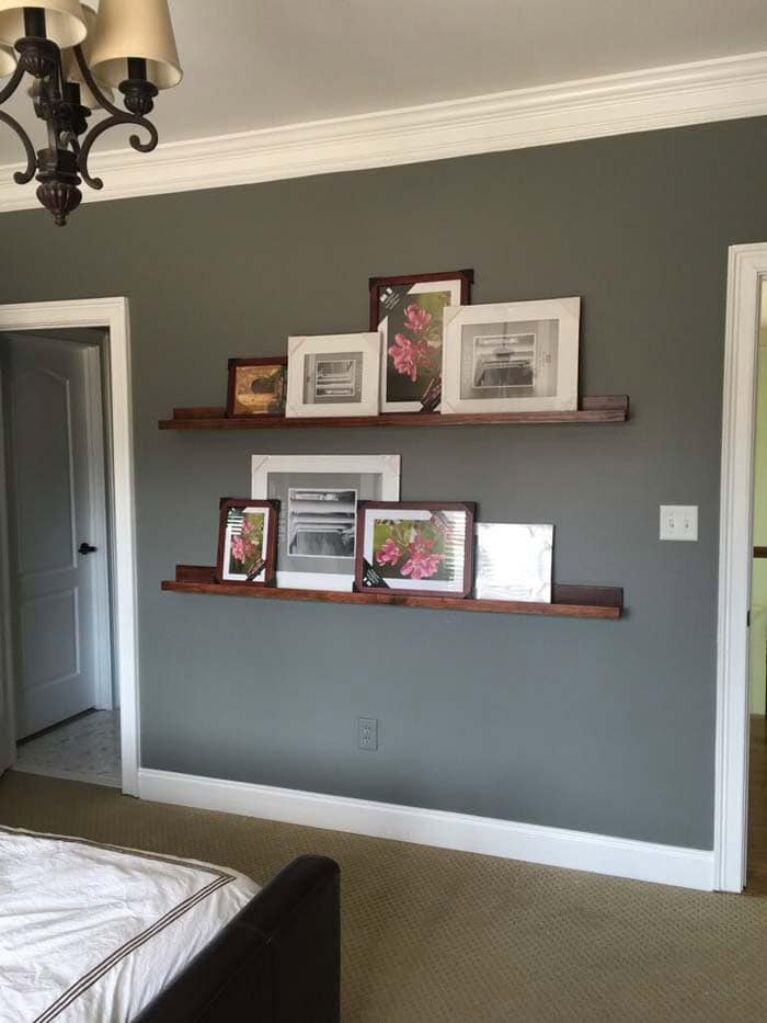 Dark-Stained Floating Picture Shelves in Bedroom