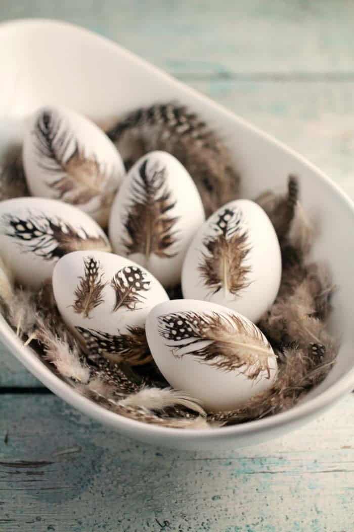 Glue Feathers on Boiled Eggs for a Rustic Easter Look