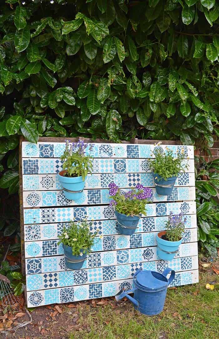 Rustic Garden with DIY Pallet Planter and Moroccan Tiles