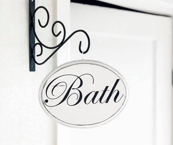 Impress Guests with a Bathroom Door Sign