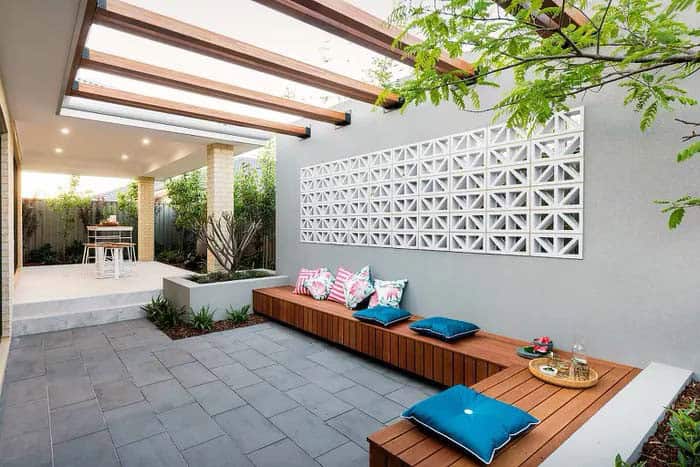 Patio Protected With Cement Wall and Cross Beams