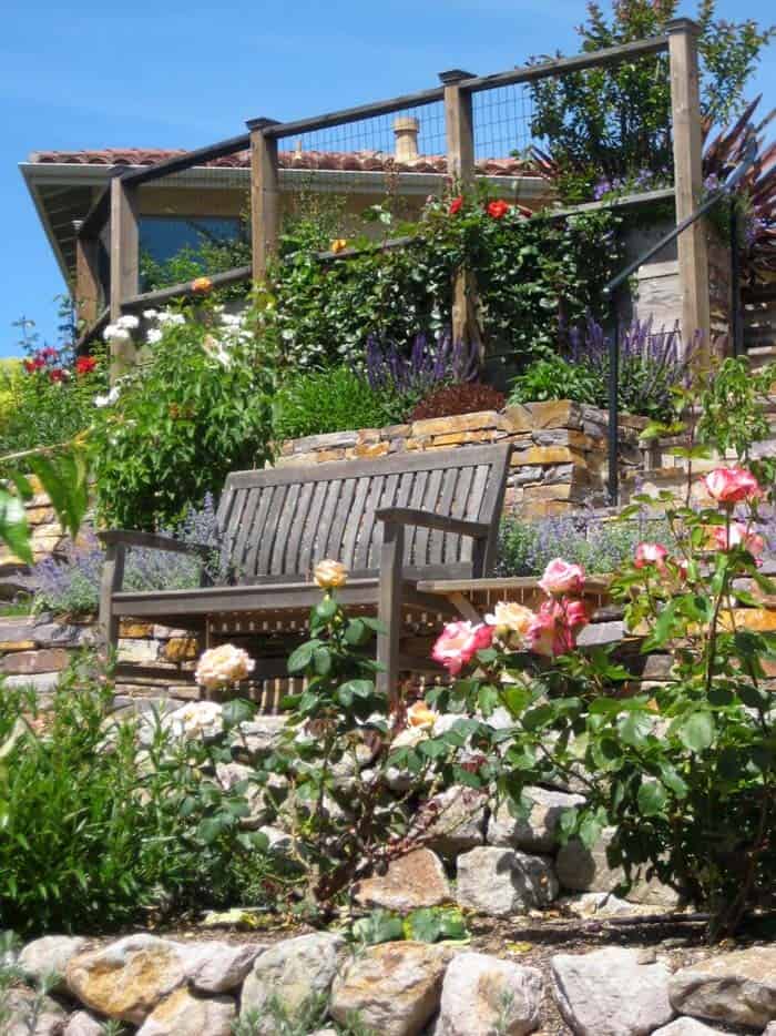 Add Charm to a Rose Garden with Multi-Tiered Seating Area