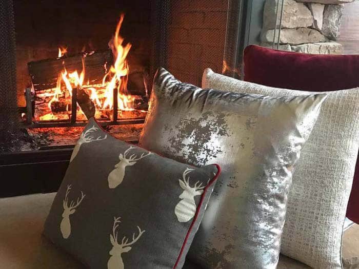 Add Holiday Cheer to Your Sofa with Silver Christmas Pillows