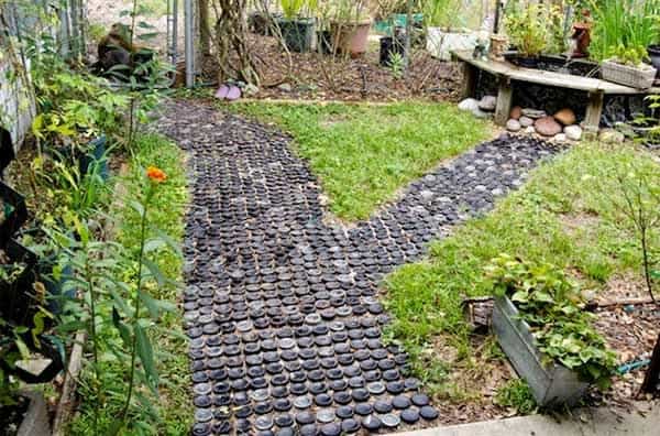 Bottles turned upside-down garden pathway