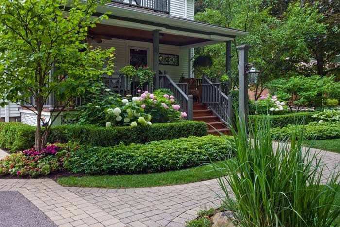 Hide The Porch Skirting with Layered Landscape