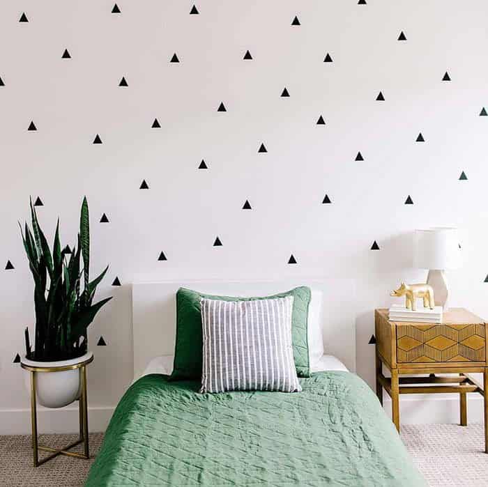 Small Triangles On A Pure White Wall