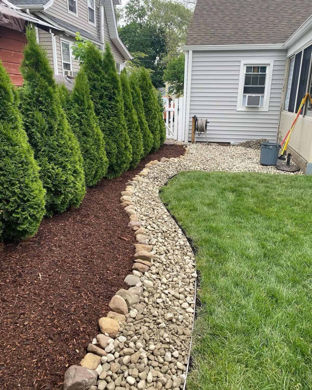 Curved Garden Edge With River Stones