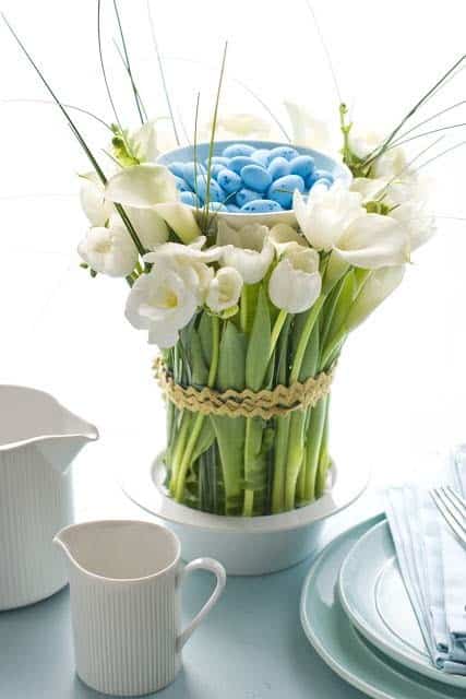 Easter Table Arrangement with White Lilies and Eggs