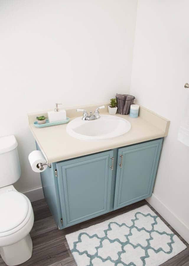 A Bathroom Vanity With A Farmhouse Look