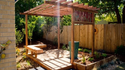 Upgrade Your Backyard Deck with a Pergola and Fire Pit