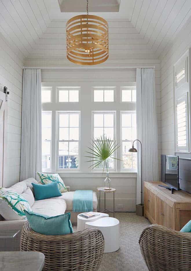 Beachy Rattan In A Bright Sunroom