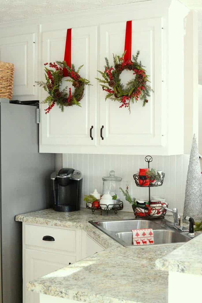 Hang Boxwood and Holly Mini Wreaths with a Red Ribbon