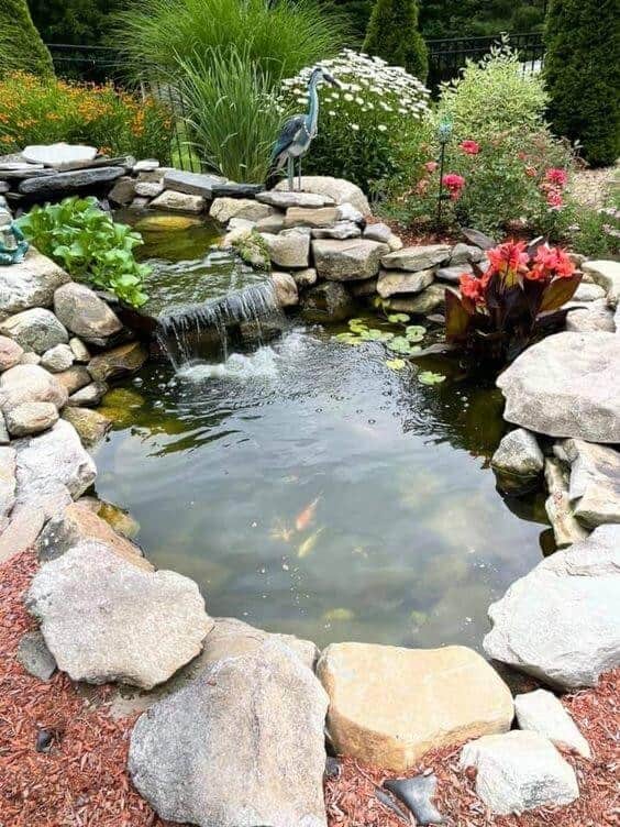 Rock Garden With Waterfall and Koi Pond