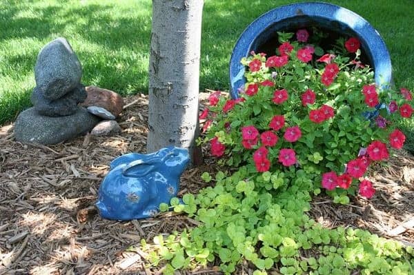 Accentuate Your Magical Flower Garden with a Rustic Bunny